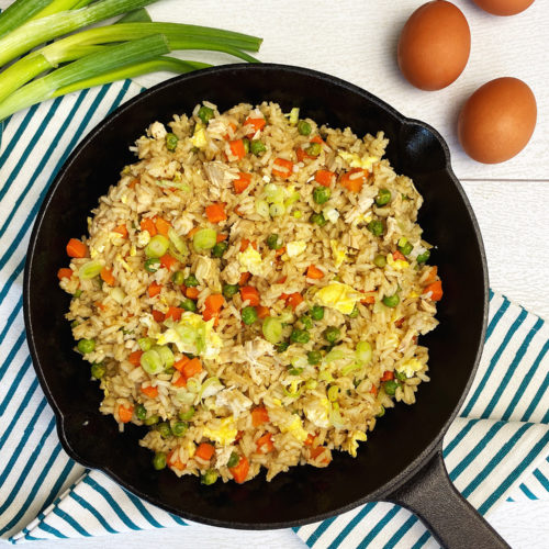 Looking for a quick and delicious meal? Try our Chicken Chopper Rice  recipe! Cooked in a savory sauce, served over fluffy rice with a half-fry  egg. Garnished with spring onions for extra